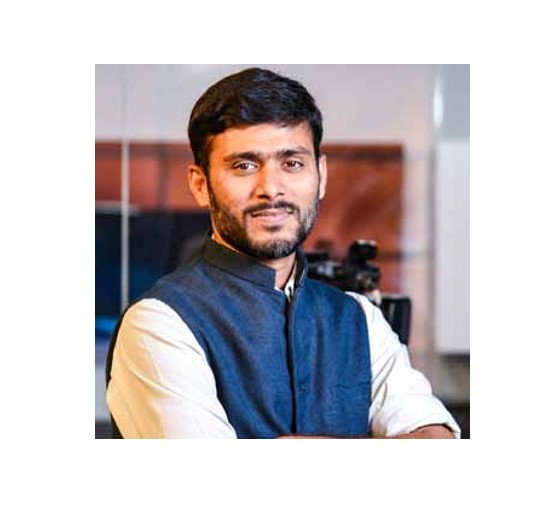 Dr. Tilak Jha